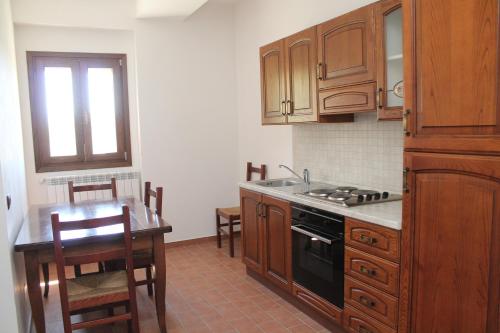 Kuchyň nebo kuchyňský kout v ubytování Hotel Il Feudo Dei Pierleoni