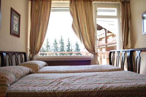 Postel nebo postele na pokoji v ubytování Spacious & Cozy, Europe