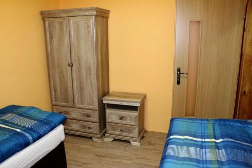 Postel nebo postele na pokoji v ubytování Ubytovanie Tri ruže