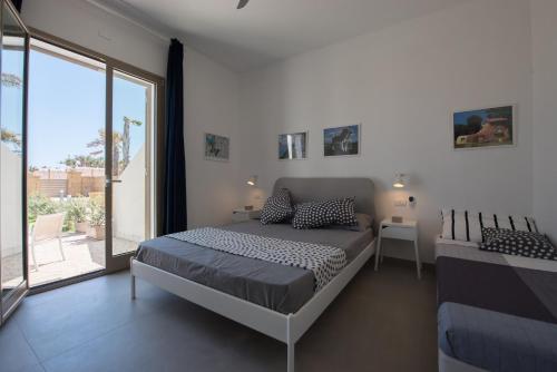 Postel nebo postele na pokoji v ubytování Arabel Villas