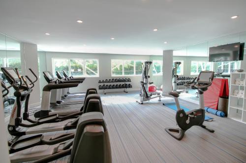 a gym with treadmills and elliptical machines at B Ocean Resort Fort Lauderdale Beach in Fort Lauderdale