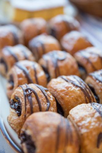 a bunch of donuts sitting on top of a tray at Hotel Sultán in Can Picafort