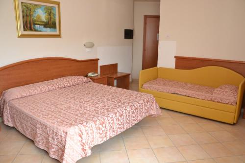 A bed or beds in a room at Perticari