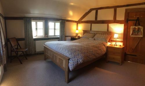 מיטה או מיטות בחדר ב-Yew Tree Cottage