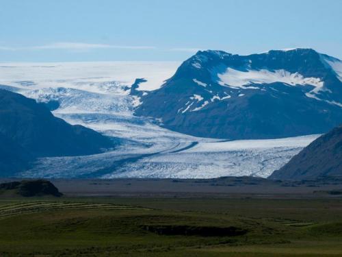a large glacier in front of a mountain at Guesthouse Nypugardar in Höfn