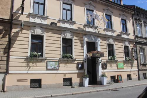 a building on the side of a street at Hotel Amadeus in České Budějovice