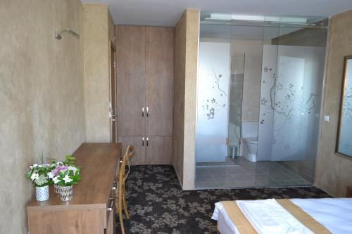 Garni Hotel Chicha - Winery ŠKRBIĆにあるベッド