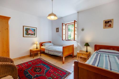 Ένα ή περισσότερα κρεβάτια σε δωμάτιο στο Family House Lana