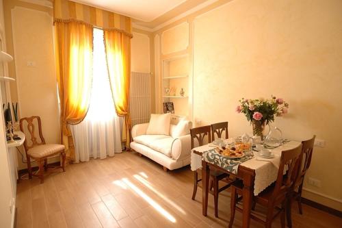 A bed or beds in a room at Corte dei Santi