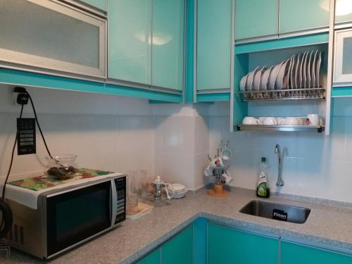 Η κουζίνα ή μικρή κουζίνα στο VVIP Homestay Villa Proton City