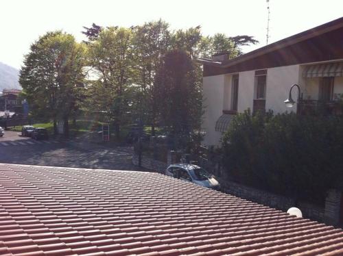 a roof of a house with an empty parking lot at Locanda Diana in Iseo