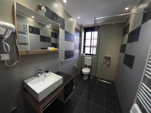 Ein Badezimmer in der Unterkunft Guest house DON-lux