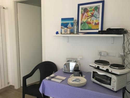 A kitchen or kitchenette at Villetta Sole