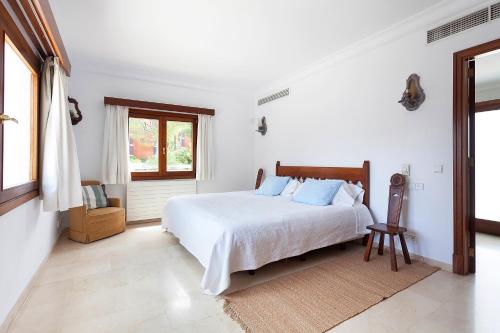 Postel nebo postele na pokoji v ubytování Ses Gerres Beach House