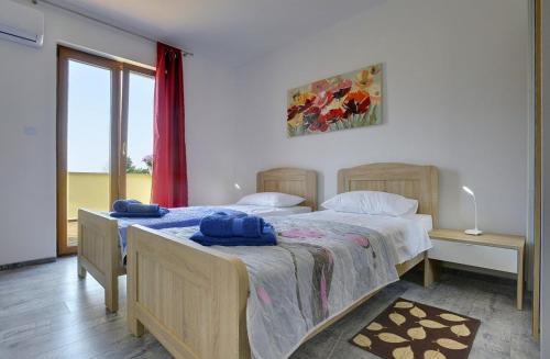 Postel nebo postele na pokoji v ubytování Villa Frankovici