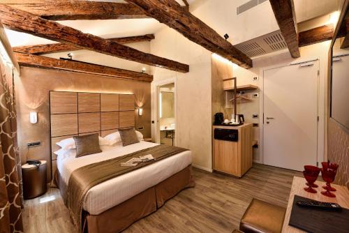 Posteľ alebo postele v izbe v ubytovaní Rosa Salva Hotel