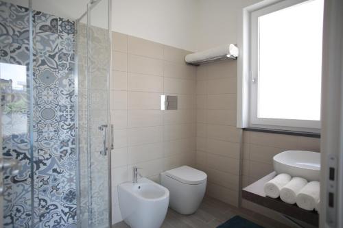 Ένα μπάνιο στο Sud Est Guest House