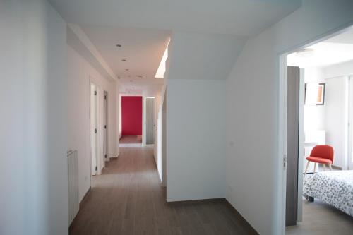 Ένα ή περισσότερα κρεβάτια σε δωμάτιο στο Sud Est Guest House