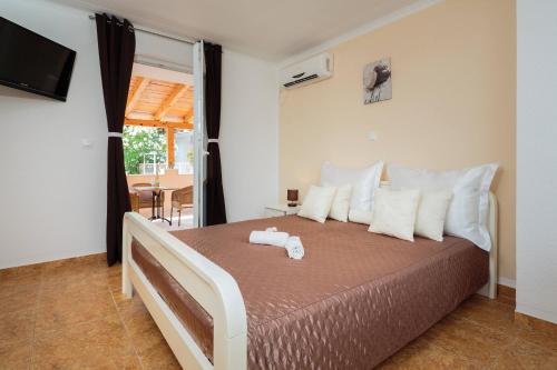 Postel nebo postele na pokoji v ubytování Apartment Krželj