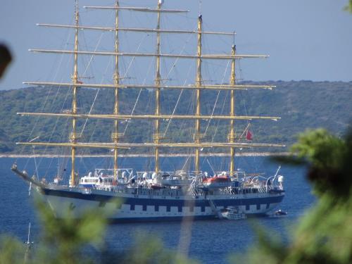 a large ship sitting in the water at Castle Štambuk in Hvar