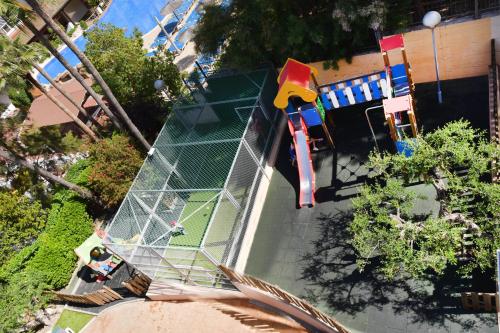 an overhead view of a building with a playground at Aparthotel SunClub Salou in Salou