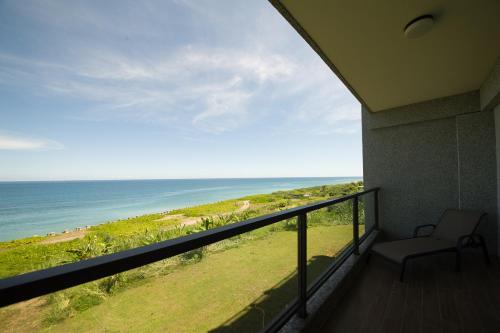 a balcony with a view of the ocean at Whitecaps B&B in Yanliau