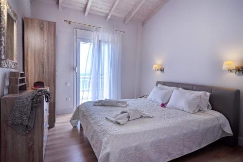 Posteľ alebo postele v izbe v ubytovaní Veroniki Penthouse Deluxe Apartment