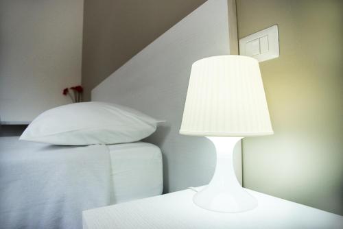 Letto o letti in una camera di Blu Salentino b&b con Parcheggio Privato Gratuito
