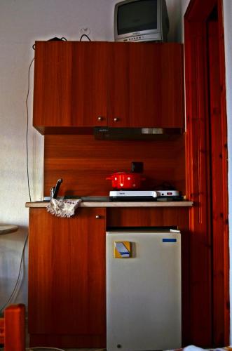 Kuchyň nebo kuchyňský kout v ubytování Amversa's Rooms