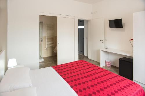 Letto o letti in una camera di Blu Salentino b&b con Parcheggio Privato Gratuito