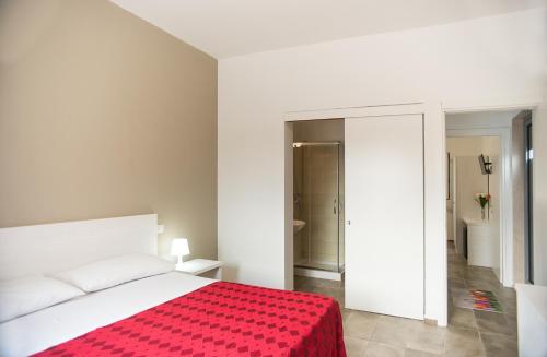 Letto o letti in una camera di Blu Salentino b&b con Parcheggio Privato Gratuito