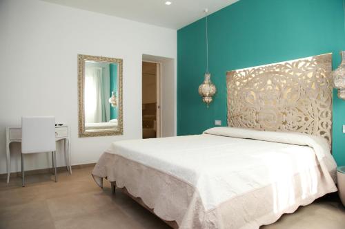 Postel nebo postele na pokoji v ubytování Hypnos Boutique Hotel