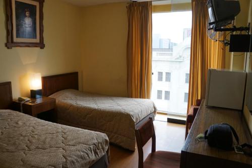 Cama o camas de una habitación en Hotel El Plaza Centro de Lima