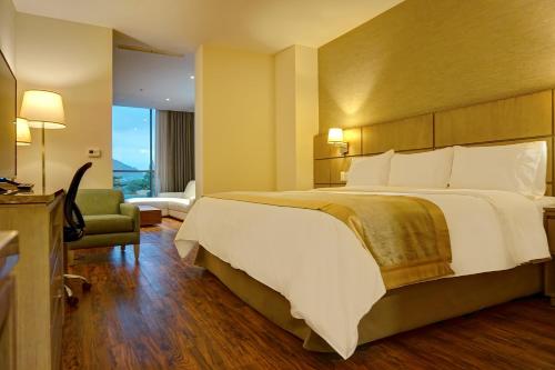Postel nebo postele na pokoji v ubytování Radisson Hotel Guayaquil