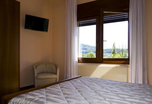 Postel nebo postele na pokoji v ubytování B&B La Palanca