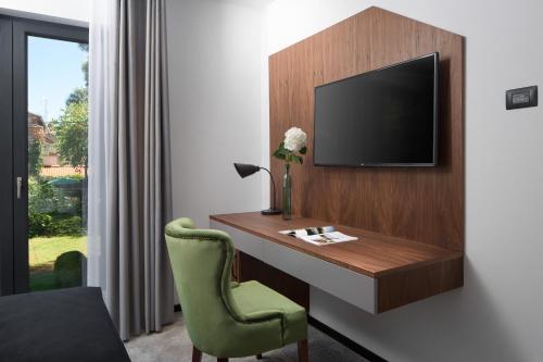 Televisyen dan/atau pusat hiburan di Hotel Delfin