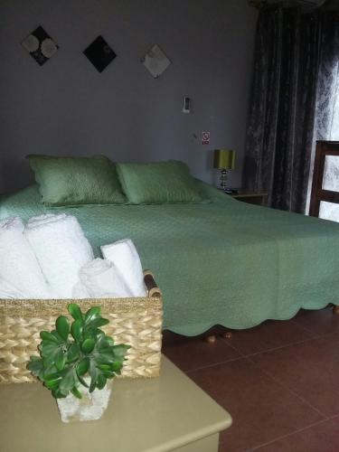 Ένα ή περισσότερα κρεβάτια σε δωμάτιο στο Guesthouse El Tata