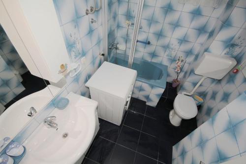 Kylpyhuone majoituspaikassa Apartment Adriatica City