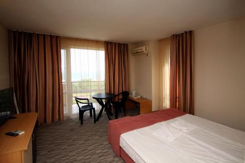Postel nebo postele na pokoji v ubytování Hotel Briz