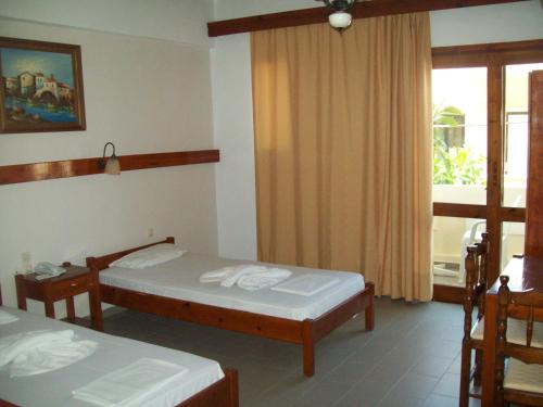 Katil atau katil-katil dalam bilik di Kato Stalos Beach