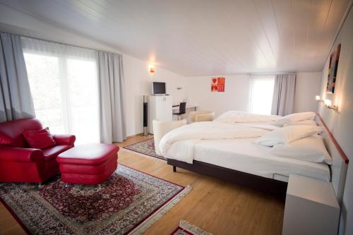 Postel nebo postele na pokoji v ubytování Hotel Hohberg "Next to BBC Arena"