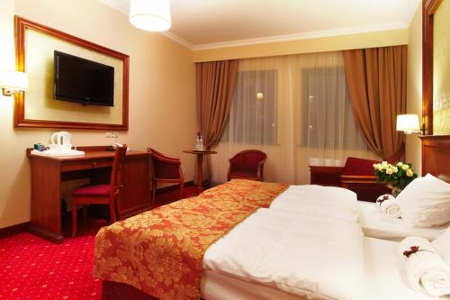 Katil atau katil-katil dalam bilik di Hotel Grodzki Business & Spa