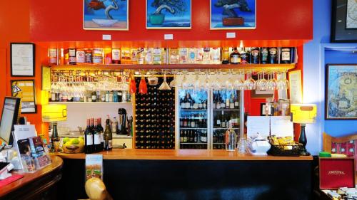 a bar with a lot of bottles of wine at New Norfolk Junction Motel in New Norfolk