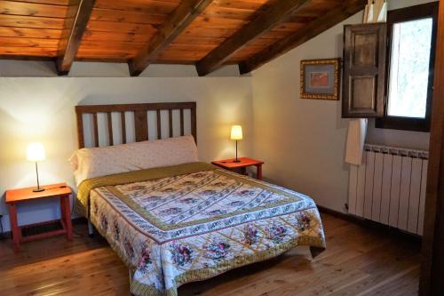 Un pat sau paturi într-o cameră la La Colmena