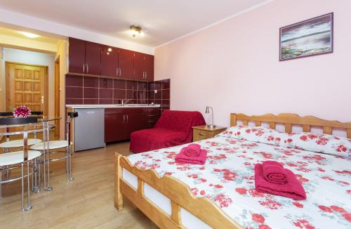 Postel nebo postele na pokoji v ubytování Djurovic Apartments Montenegro