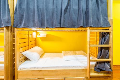 a couple of bunk beds in a room at SAHIL Hostel & Hotel in Baku