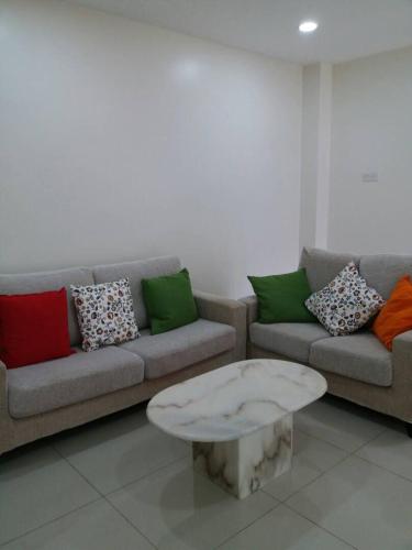 Ruang duduk di Pangkor Holiday Home