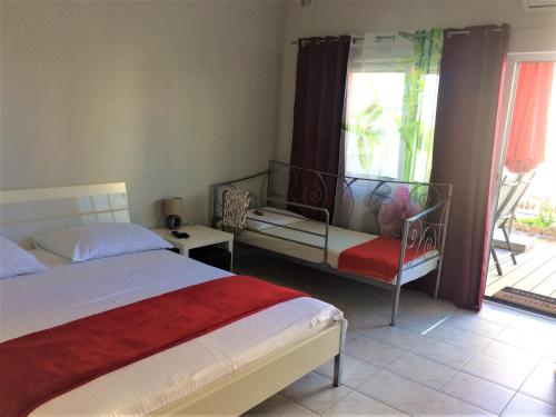 Postel nebo postele na pokoji v ubytování Apartments Marjan