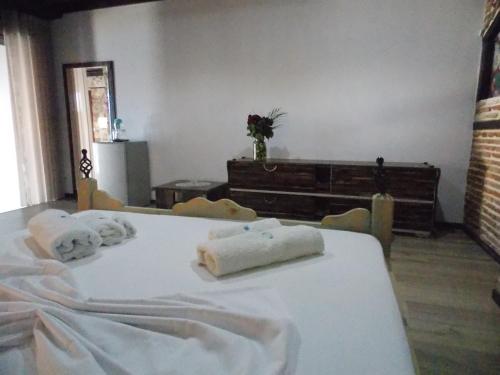 Postel nebo postele na pokoji v ubytování Sunset Suites