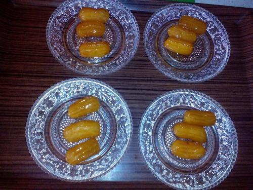 four plates of food sitting on a table at Guest House Vila Banjica in Pirot